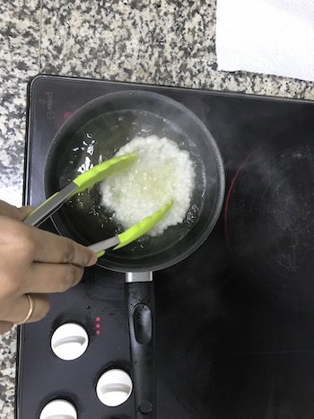 Sabudana papad frying in a pan