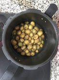 image of potato boiling