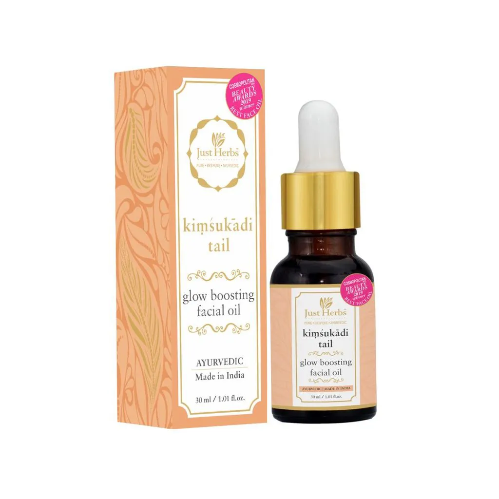 a bottle and a box of Just Herbs facial oil