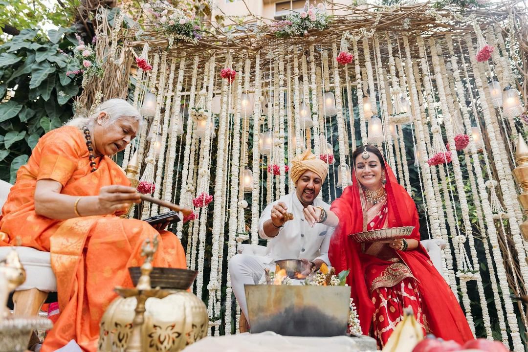 Dia Mirza and her husband getting marries by a female priest