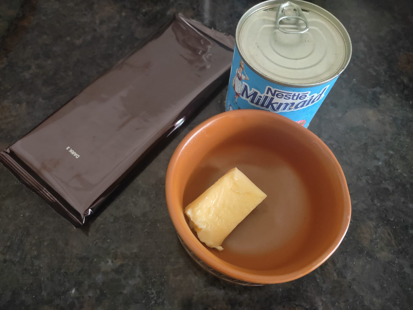 Dark chocolate, butter, condensed milk