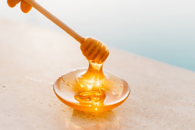 honey on an orange background