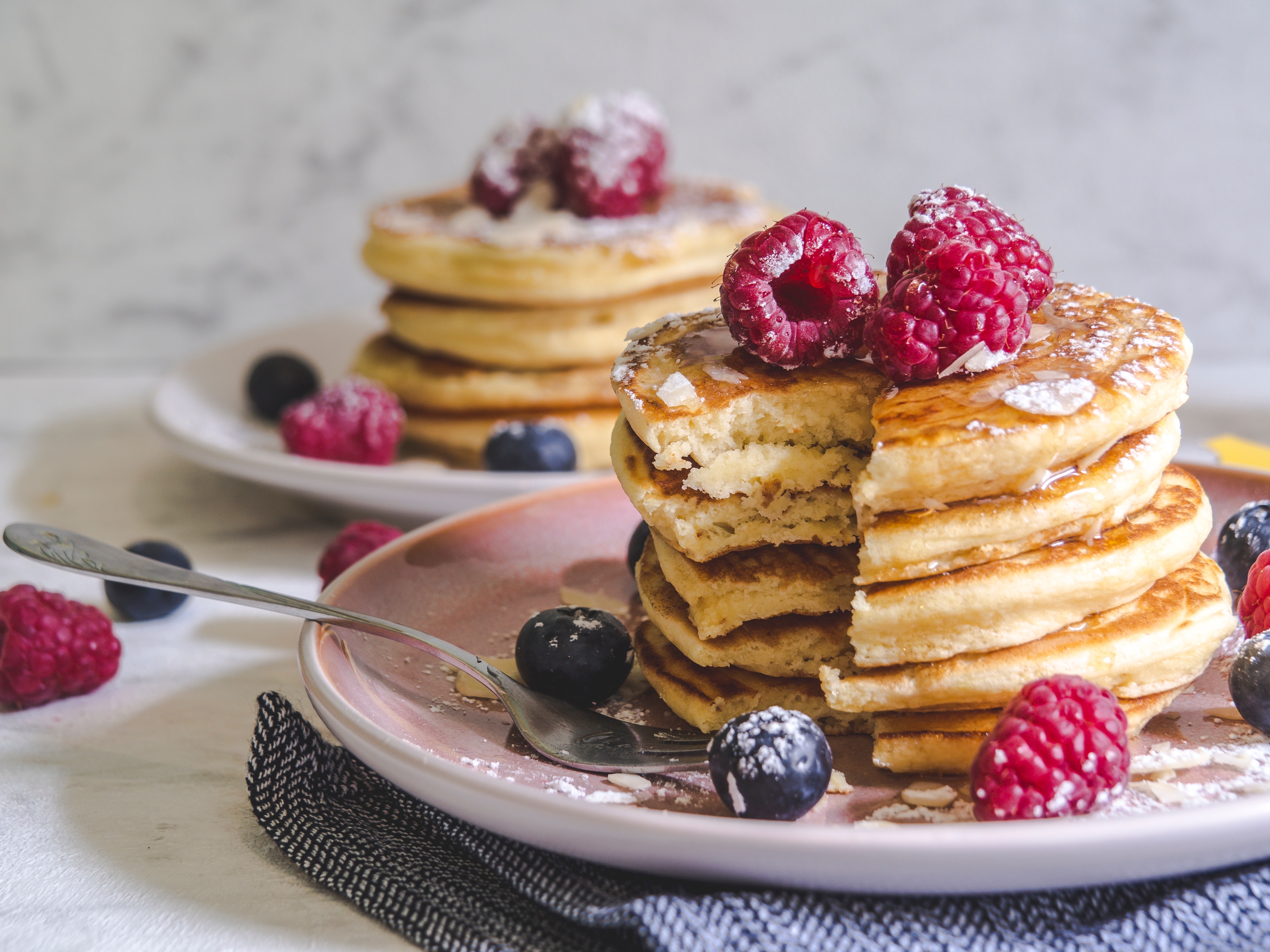 season berries and pancakes in a plate