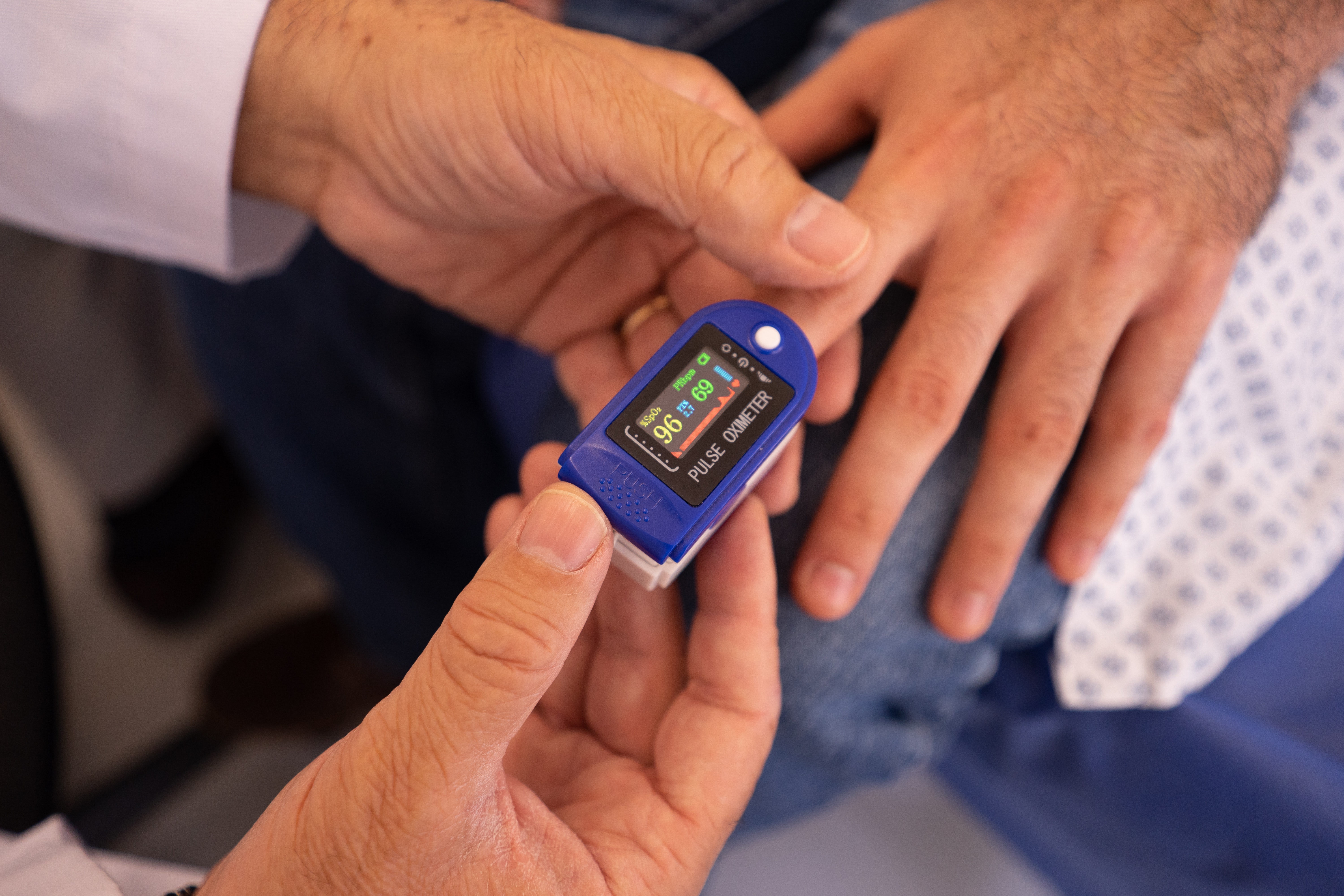 a person checking glucose levels
