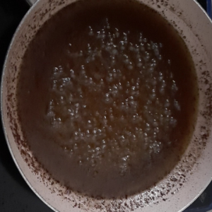 Boiling syrup in a pan