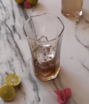 Khala khatta syrup in a glass with ice