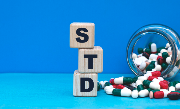 Blocks saying STD and medicines on the side