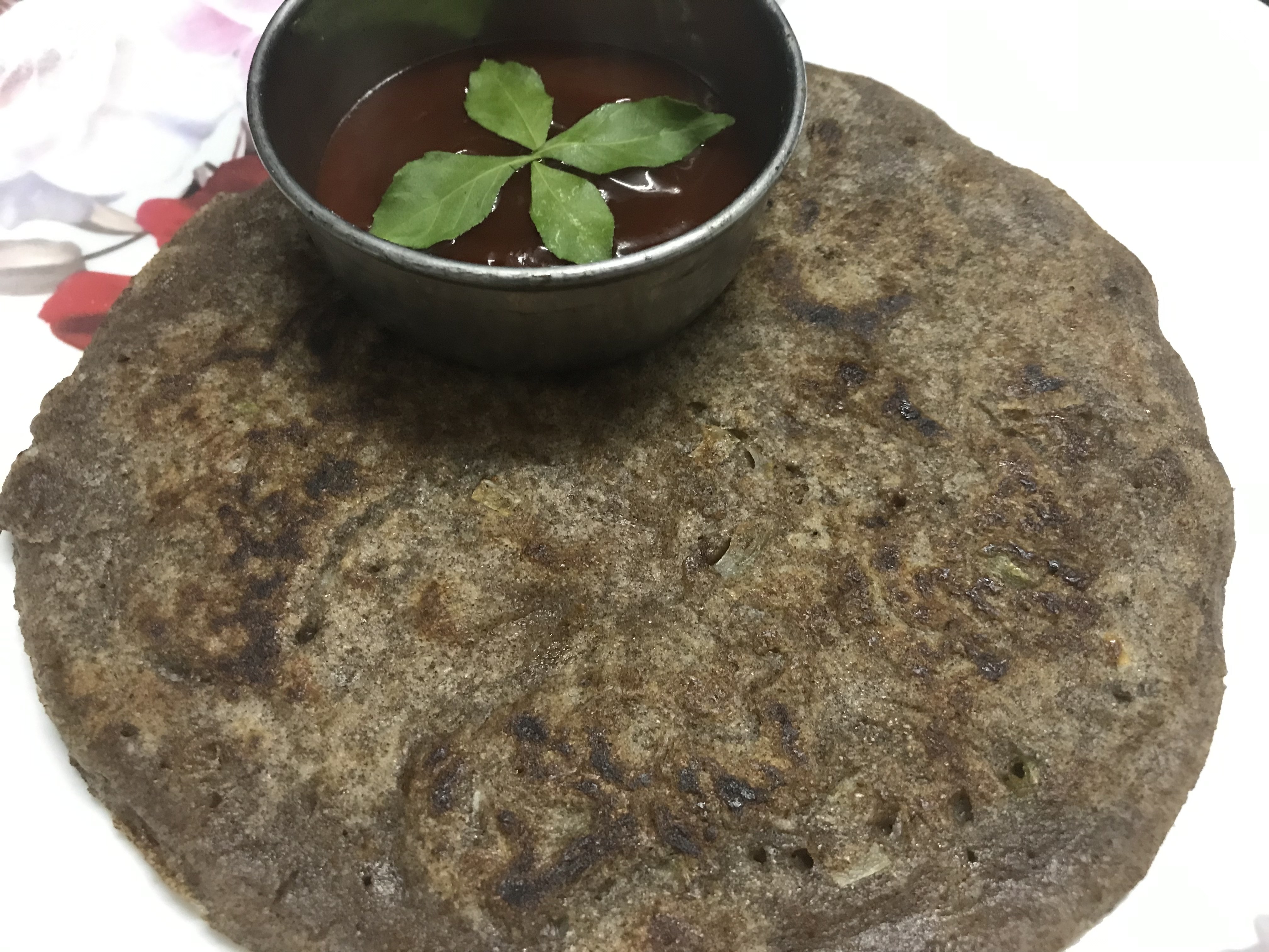 Delicious Ragi Chilla served with sauce or chutney