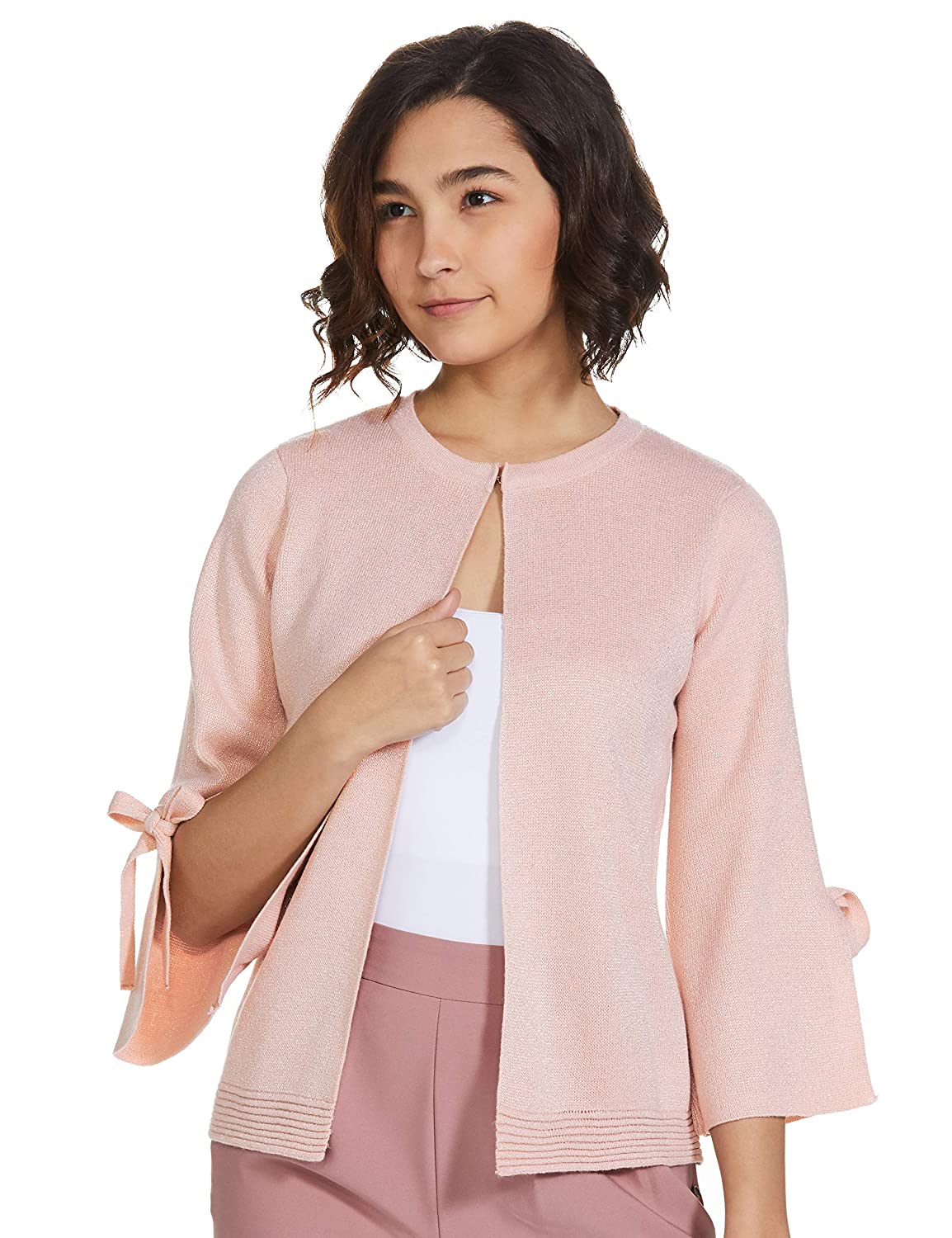 Model wearing a blush pink cardigan