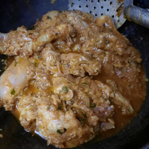 marinated chicken in sizzling oil